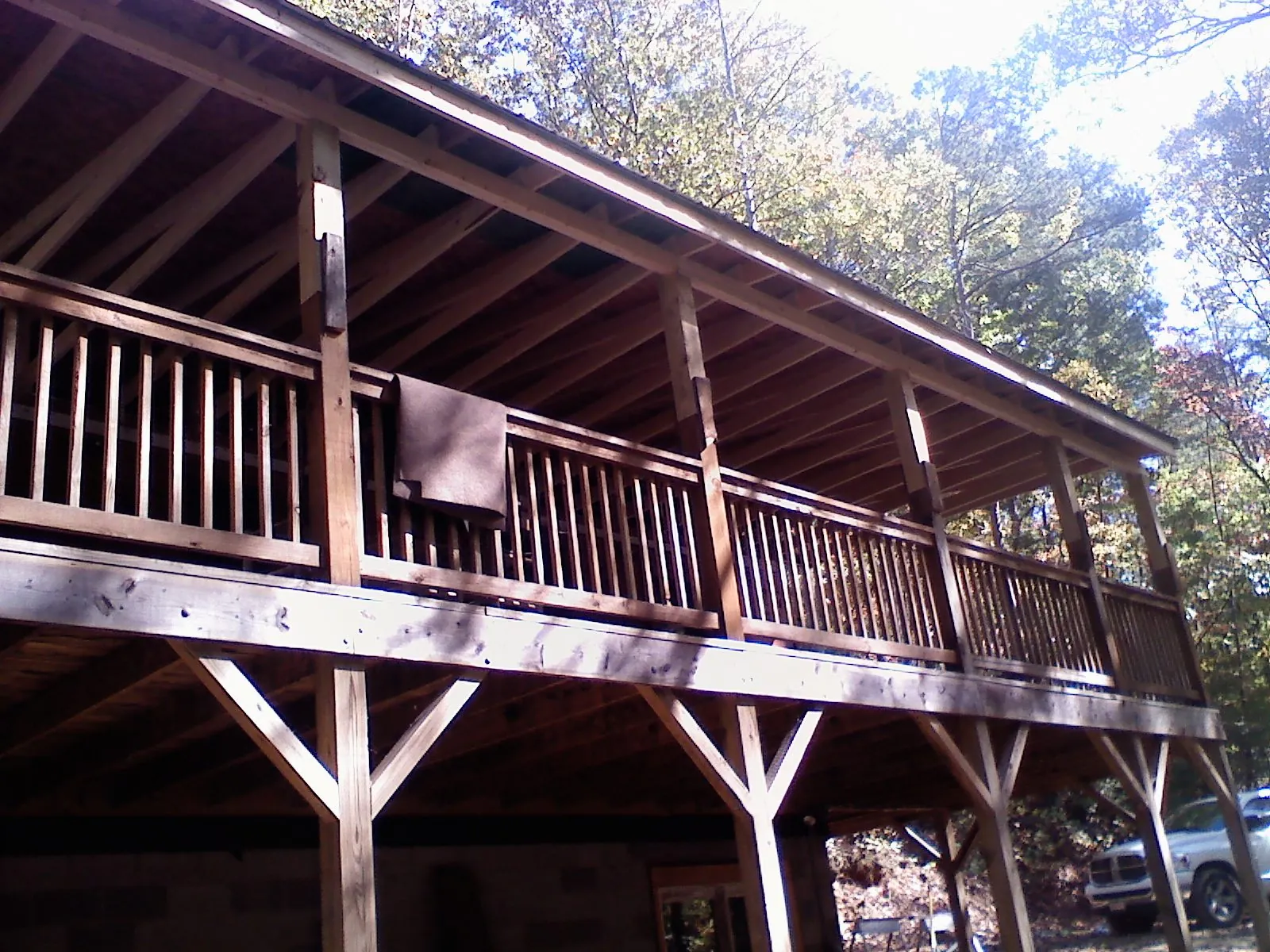 Timber framing under a new elevated porch and deck — Roof Leak Repair in Pilot Mound by Roofing Brothers
